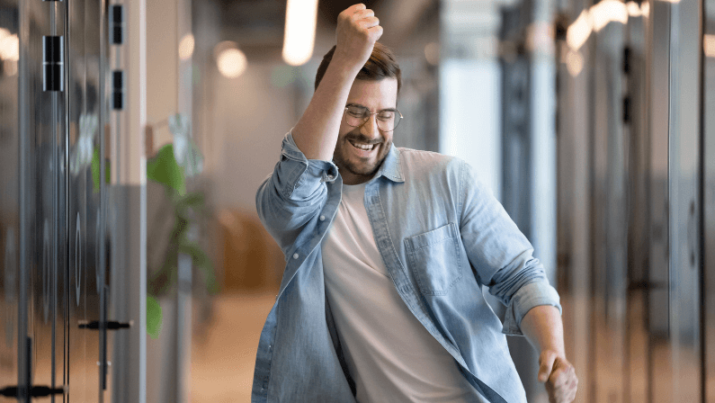 happy business man enjoy victory dance