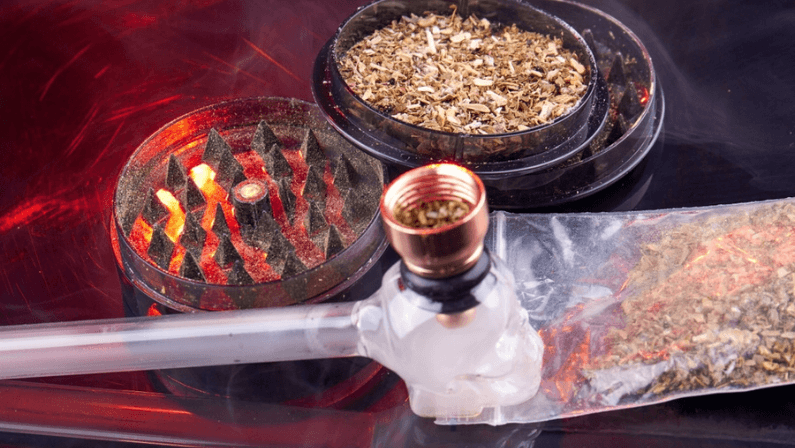 Various types of glass smoking pipes for marijuana