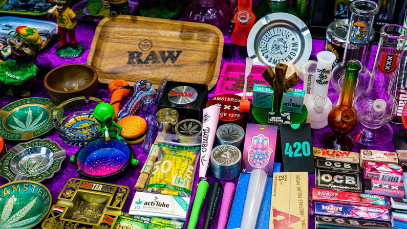 Cannabis smoking equipment for sale in shop. Recreational use of cannabis is allowed in some countries but not others